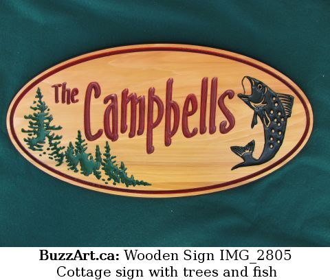 Cottage sign with trees and fish